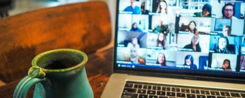 macbook pro displaying group of people